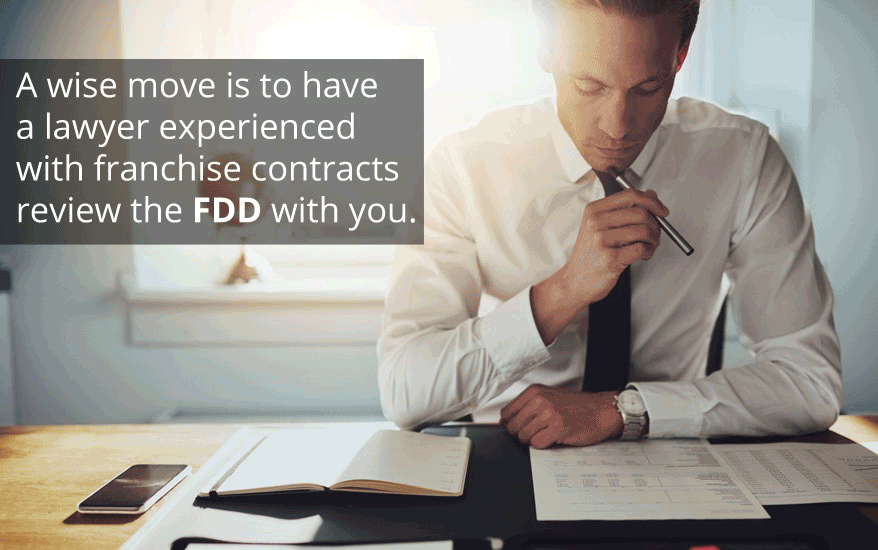 Lawyer experienced with franchise contracts reviewing FDD